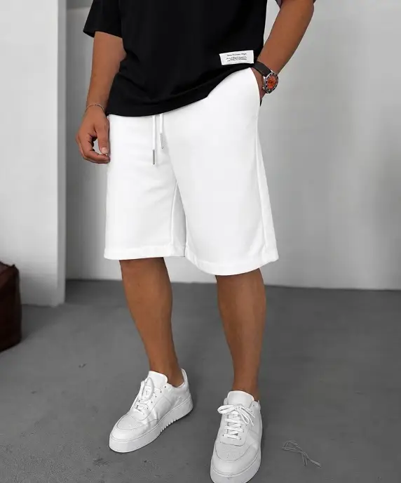Relaxed White Sweat Shorts and an Oversized Black Tee