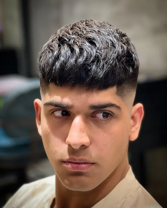 23 Trendy French Crop Hairstyles for Men to Try in 2026 3 The Wavy French Crop With a High Skin Fade