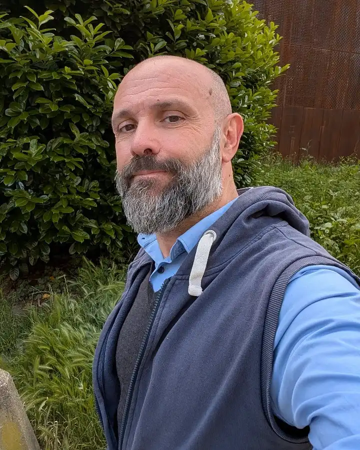 17 Bold Beard Styles for Bald Men to Stand Out 7 A Tapered Beard That Fades Shorter Near the Ears