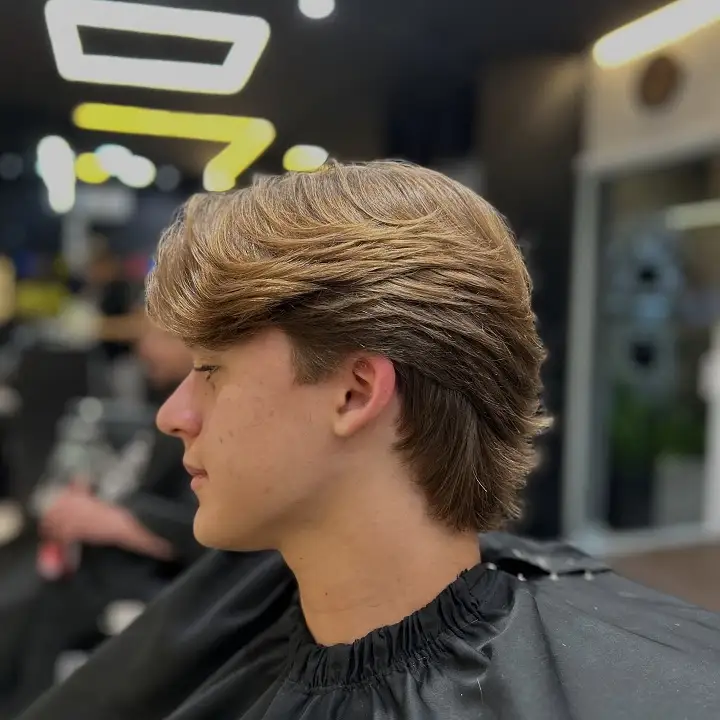 17 Classic Medium Length Mens Haircuts and Exactly What to Ask Your Barber 5 Blow Dried Flow With Weight Left at the Back