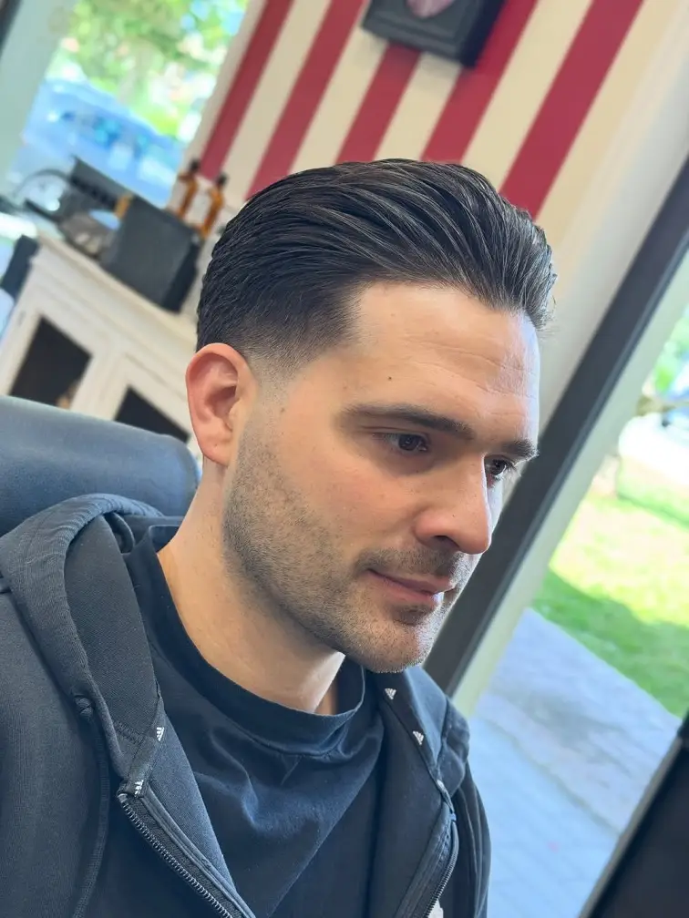 The Side Swept Slick Back for a Receding Hairline