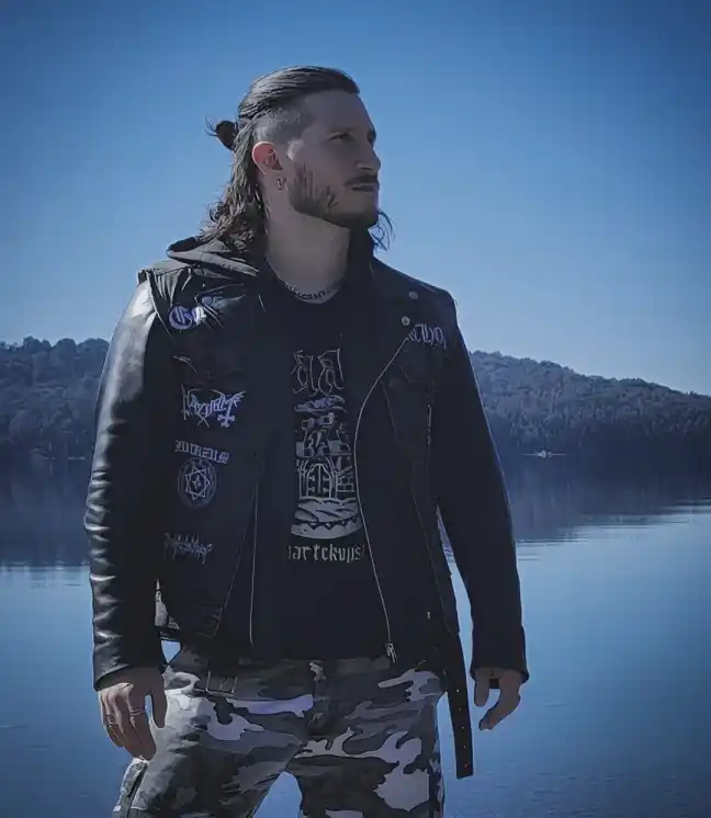 Patch Covered Battle Jacket Over Camo Pants