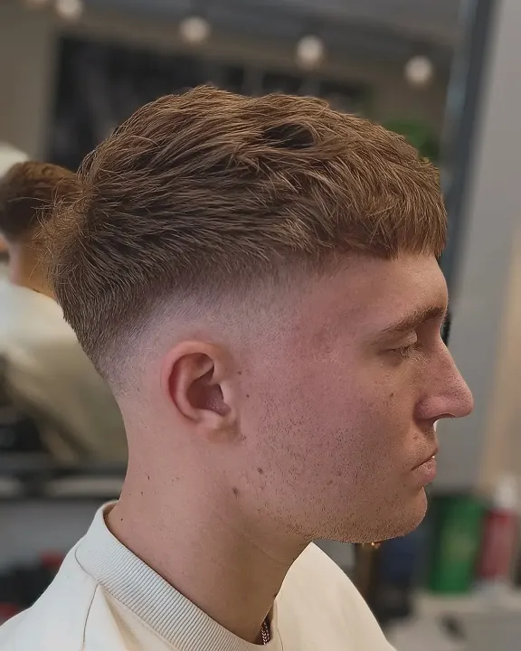 23 Trendy French Crop Hairstyles for Men to Try in 2026 10 Longer Textured French Crop With a Drop Fade