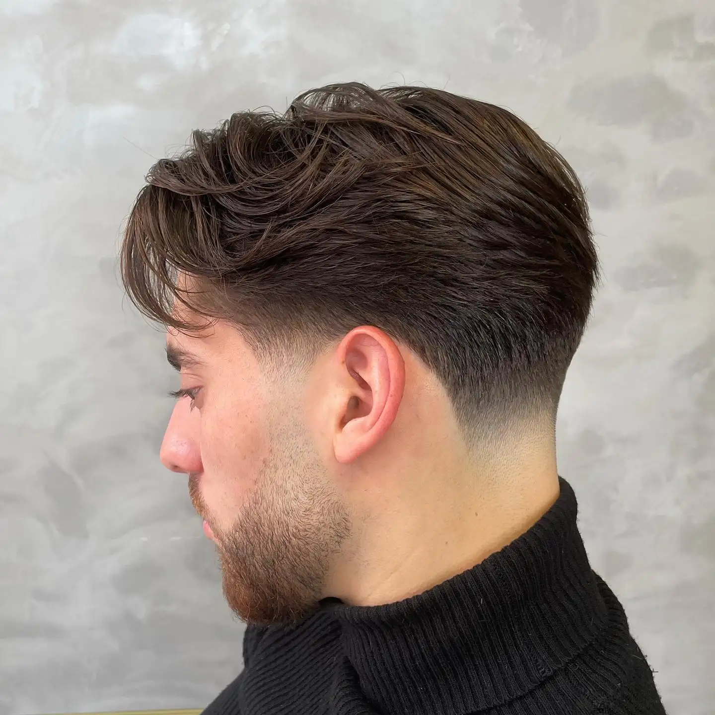 16 Awesome Quiff Hairstyles for Men That Never Miss Today 2 Grown Out Wavy Quiff With a Soft Low Taper