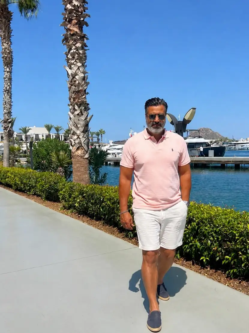 20 Linen Shorts Outfits for Men: Easy Summer Style That Works Every Time 6 A Pink Polo Proves Soft Color Belongs at the Marina
