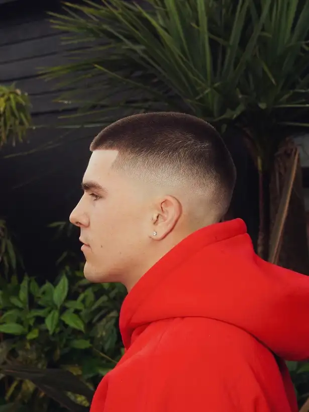 20 Trendy Buzzcut Hairstyles for Men for Every Face and Hairline 7 The Textured Buzz With Soft Spikes on Top