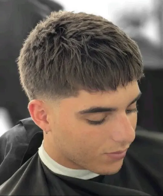 23 Trendy French Crop Hairstyles for Men to Try in 2026 15 Dense Textured Crop With a Blunt Fringe