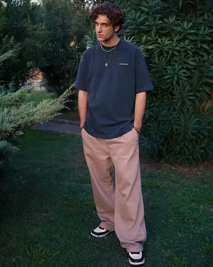16 Wide Pants Outfit Ideas for Men That Actually Look Put Together 7 Tan Wide Pants and an Oversized Tee for a Relaxed Streetwear Fit