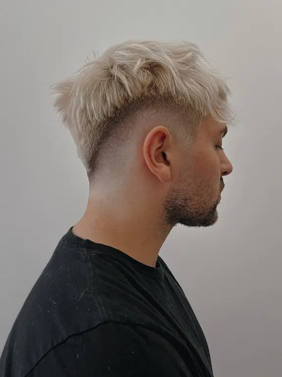 23 Trendy French Crop Hairstyles for Men to Try in 2026 13 Messy Blonde Crop With a High Fade
