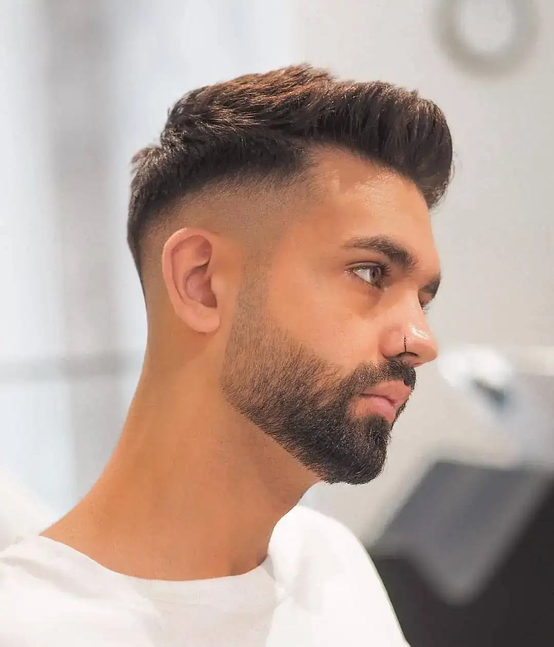 16 Awesome Quiff Hairstyles for Men That Never Miss Today 4 Tall Front Quiff With a Drop Fade for a Rounder Face
