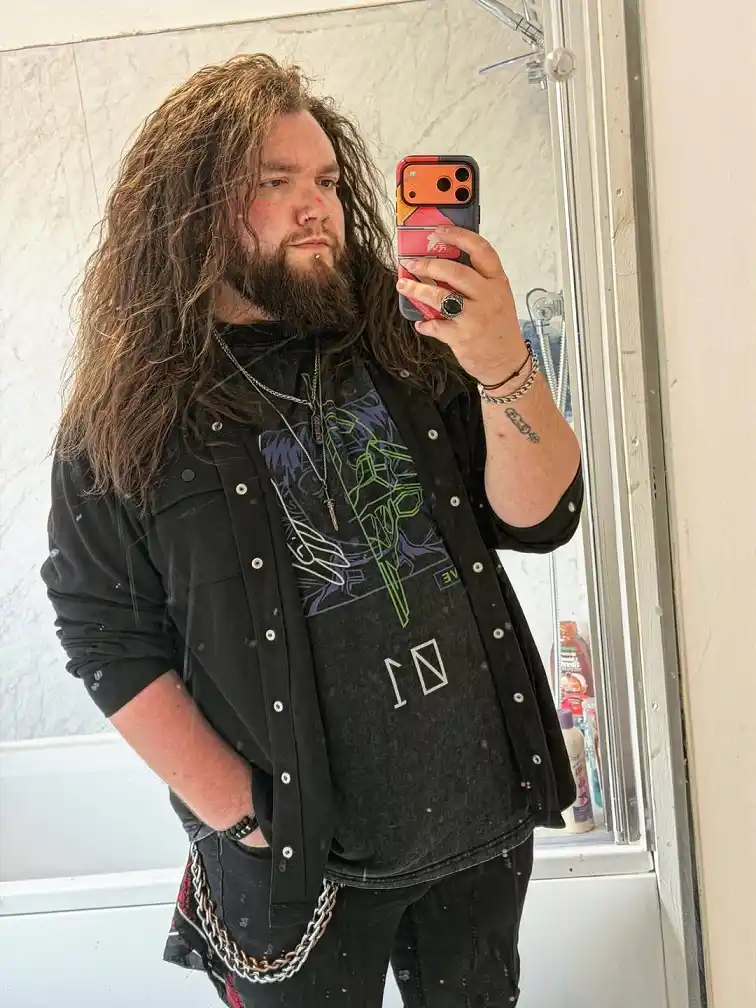 Open Button Up Shirt Layered Over a Printed Tee