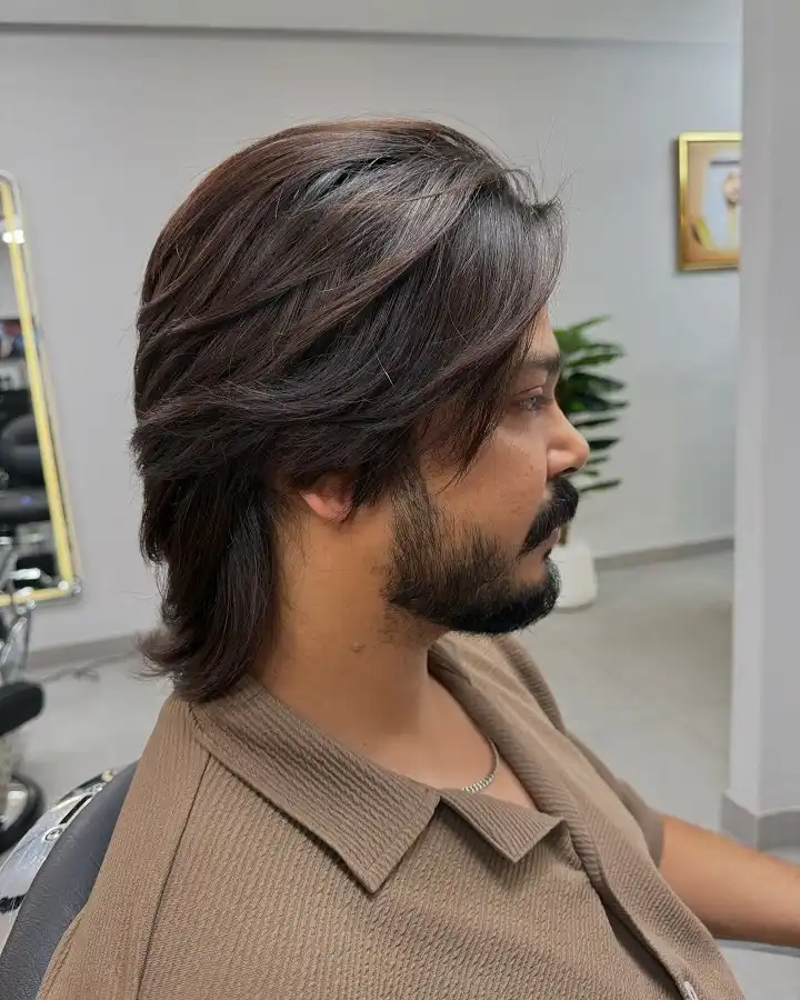 17 Classic Medium Length Mens Haircuts and Exactly What to Ask Your Barber 12 Shoulder Grazing Layers With a Deep Side Sweep