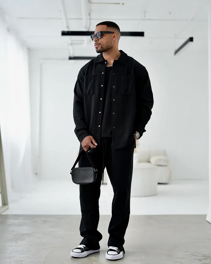 21 Stylish Black Outfit Ideas for Men That Look Effortlessly Cool 5 Black Overshirt Over a Tee With Relaxed Joggers
