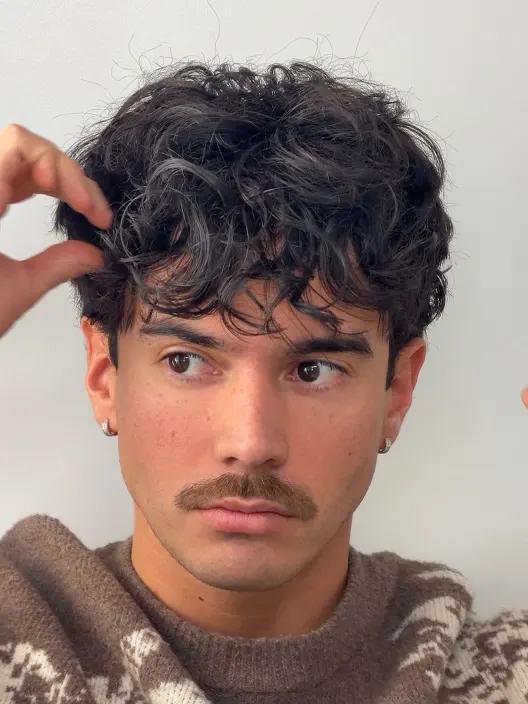 20 Wavy Hair Men Ideas That Look Natural and Stylish Now 3 The Messy Fringe with Faded Sides
