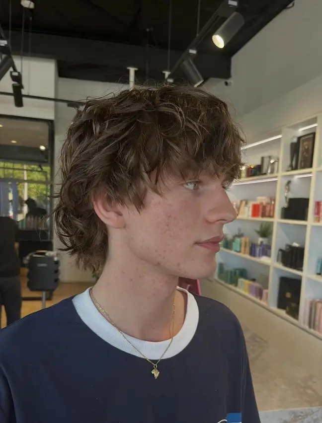 20 Wavy Hair Men Ideas That Look Natural and Stylish Now 11 The Shaggy Wave Mullet with Piecey Fringe