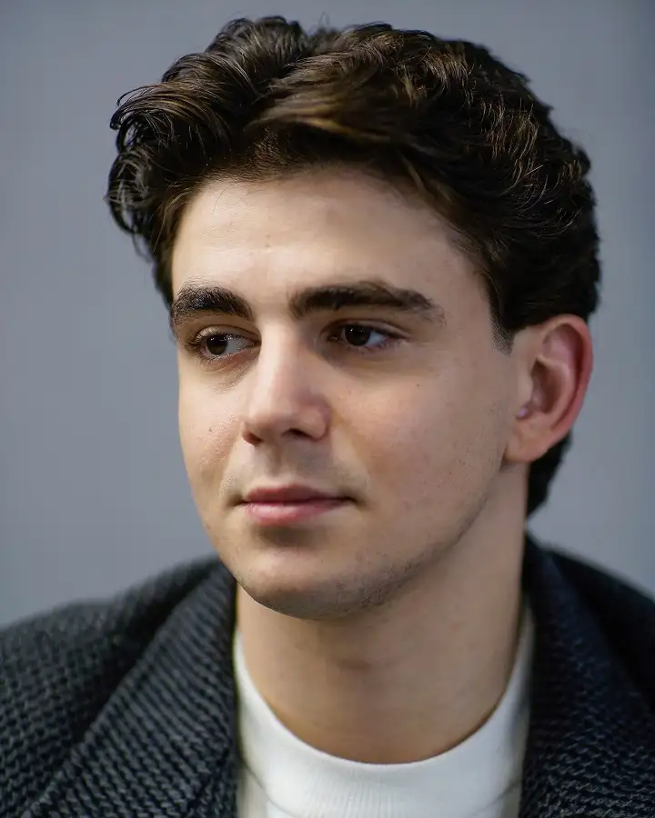 24 Timeless Old Money Haircuts for Men (With What to Ask Your Barber) 13 Wavy Side Swept Crop for Men With Natural Curl