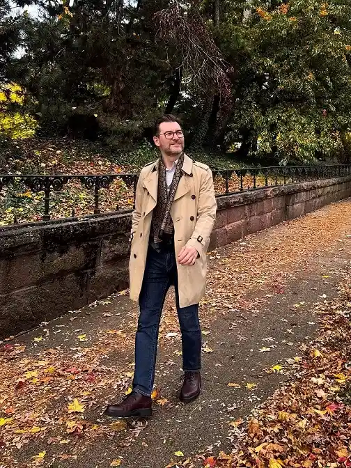 16 Casual Fall Outfit Ideas for Men That Feel Effortless Now 4 Add a Trench Coat Over Dark Denim