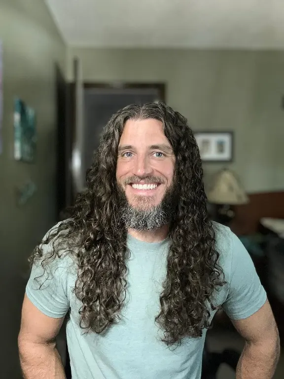 17 Bold Long Hairstyles for Men Worth Growing Your Hair For 6 Long Natural Curls