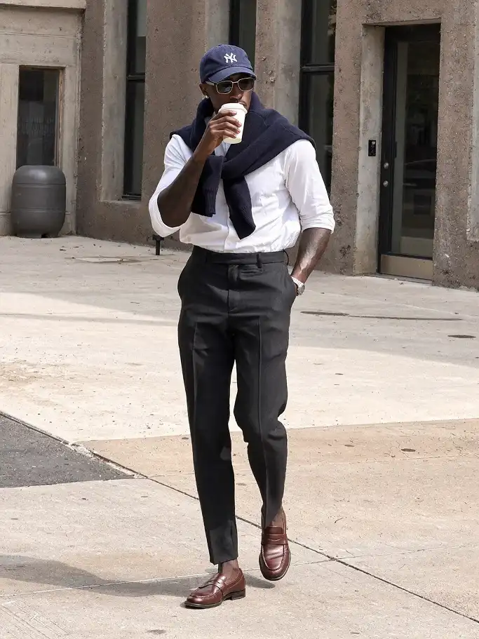 18 Men's Preppy Looks That Make Any Closet Look Expensive 7 Navy Knit Tied Over a White Shirt
