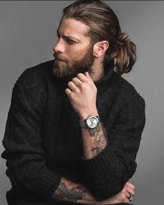 17 Bold Long Hairstyles for Men Worth Growing Your Hair For 2 Low Tied Ponytail
