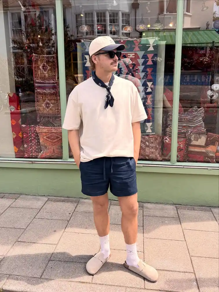 20 Linen Shorts Outfits for Men: Easy Summer Style That Works Every Time 7 Neckerchief and Clog Details Turn Basic Shorts Into a Statement