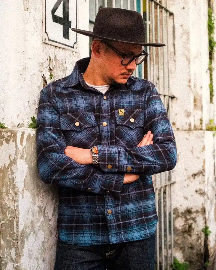 22 Men's Flannel Shirts Ideas for Fall You’ll Actually Wear 19 Blue Ombre Snap Shirt with a Felt Hat