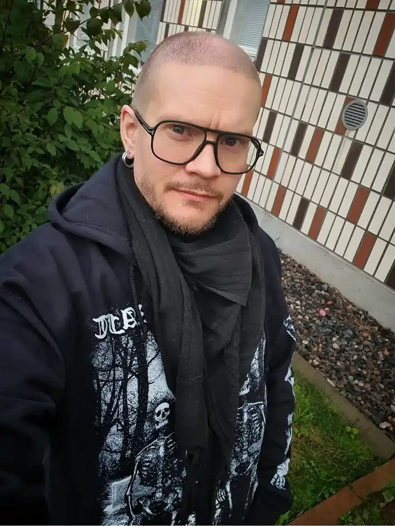 Band Hoodie With a Black Scarf Wrapped High