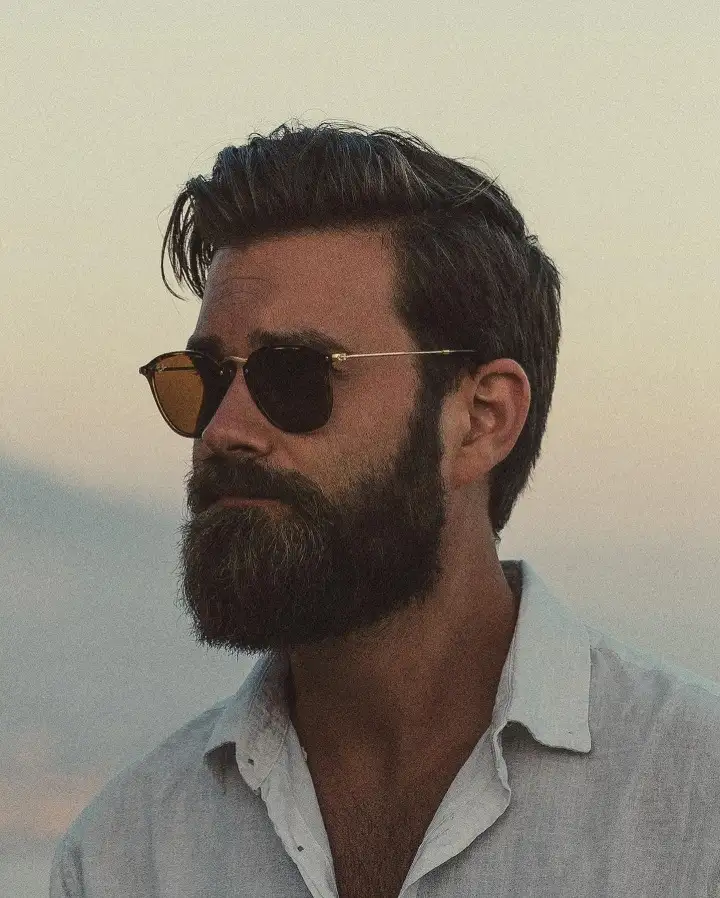 Short Beard Styles for Men: 35 Sharp Cuts for Every Face Shape 3 Grown Out Short Beard With a Natural Cheek Line