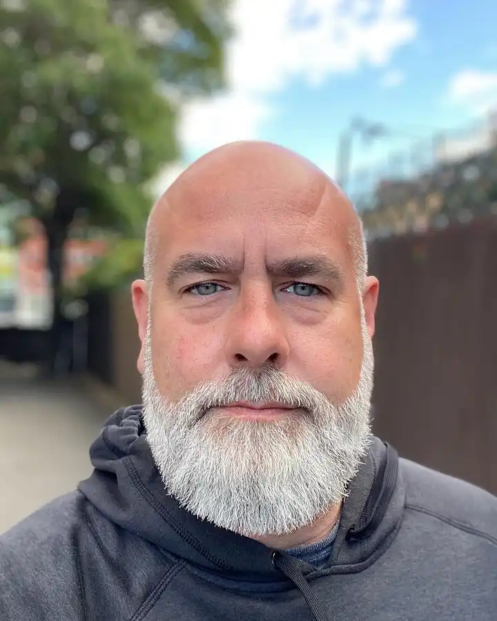17 Bold Beard Styles for Bald Men to Stand Out 9 Long, Full White Beard With a Straight Bottom Edge