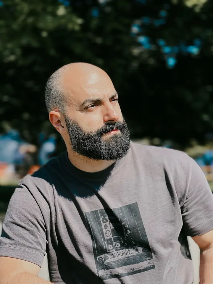 17 Bold Beard Styles for Bald Men to Stand Out 3 The Full Salt-and-Pepper Beard That Owns the Bald Look