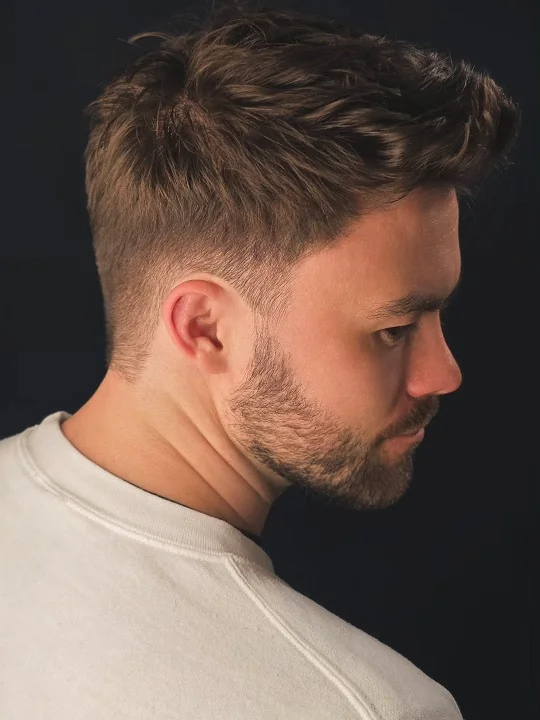 15 Straight Hair Cuts For Men Your Barber Will Understand 12 Tousled Crown With A Low Taper At The Neck