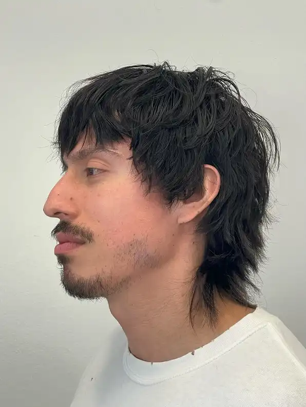 19 Wolfcut Hair for Men Styles Your Barber Will Actually Understand 13 Wispy Fringe Wolf Cut With Facial Hair to Match