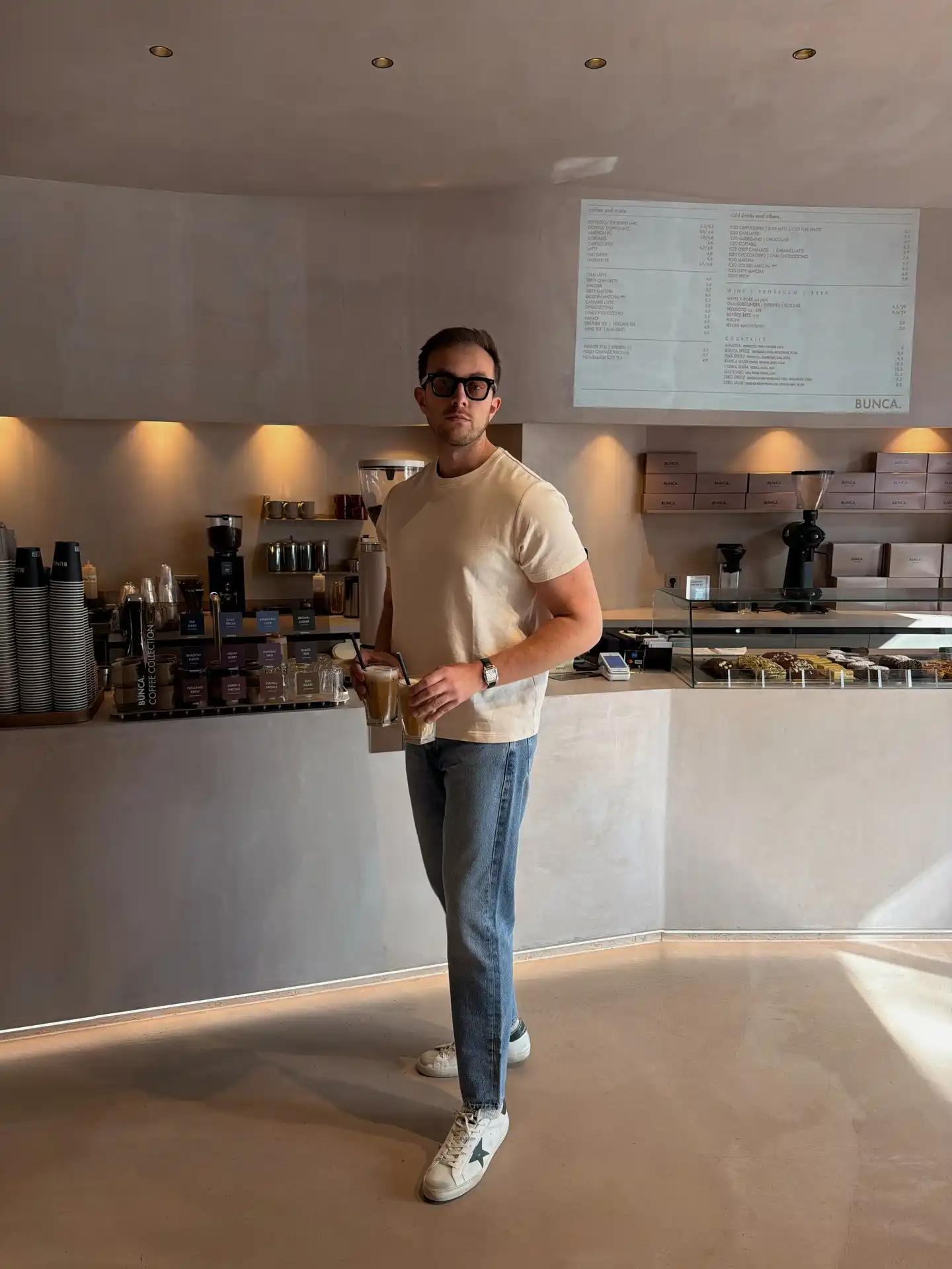 1. Cream Crew Neck Tee and Light Wash Jeans