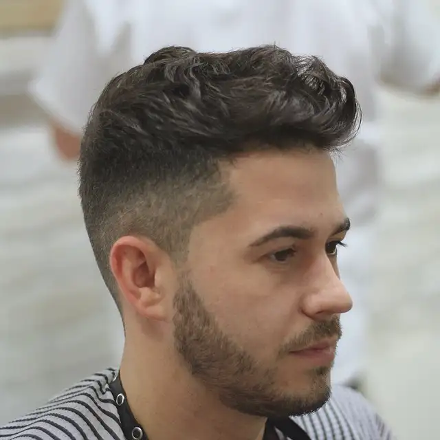 21 Masculine Haircuts for Men Over 30 That Look Sharp, Not Dated 8 Wavy Pompadour Over a High Taper