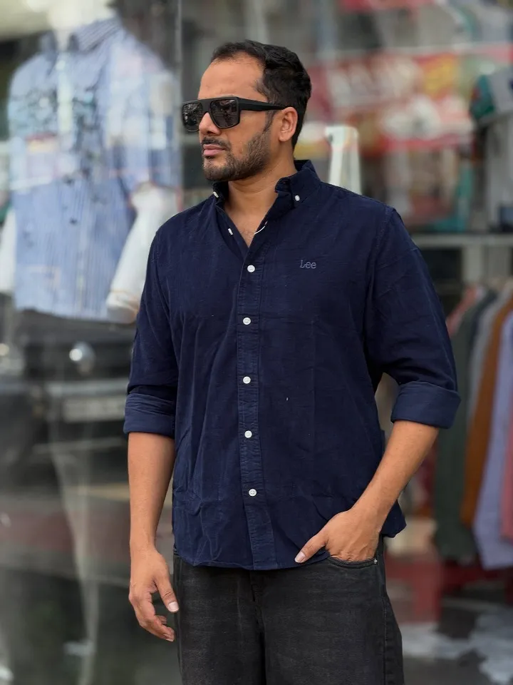 Rolled Sleeves and Black Jeans With Navy Cord