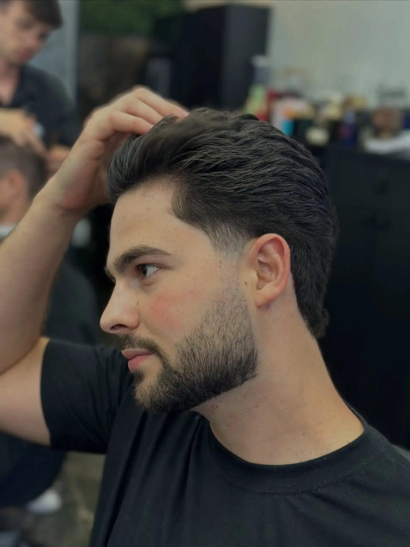 21 Masculine Haircuts for Men Over 30 That Look Sharp, Not Dated 9 Medium Length Brush Back with a Low Taper