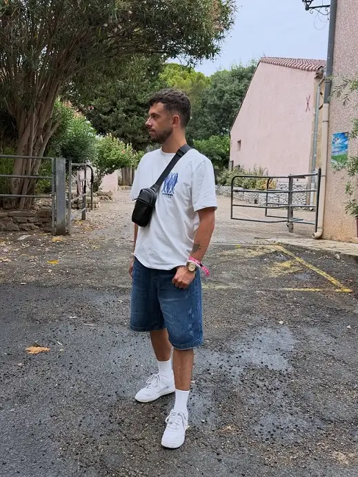 17 Summer Outfits for Short Men Who Want Better Proportions 4 Graphic Tee With Baggy Denim Shorts
