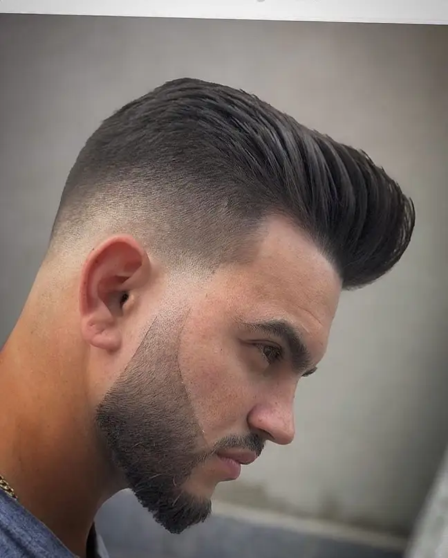20 Pompadour Hairstyles for Men, From Skin Fades to Soft Tapers 12 Glossy Skin Fade Pompadour