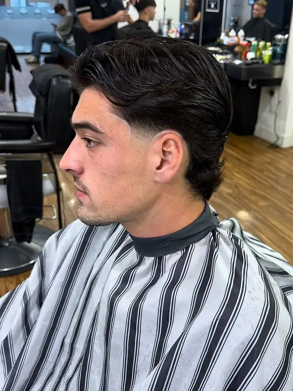21 Masculine Haircuts for Men Over 30 That Look Sharp, Not Dated 6 The Modern Mullet, Tidied Up
