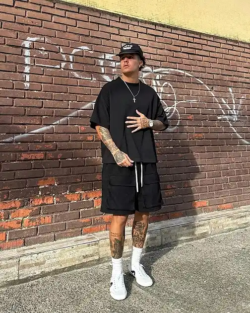 22 Black Shorts Outfit Ideas for Men That Actually Look Put Together 4 All Black Matching Set With White Sneakers for Contrast