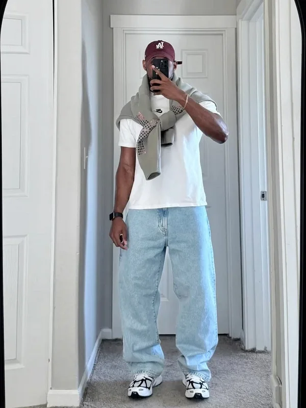 Tied Sweater Over a Tee with Icy Wash Baggy Jeans