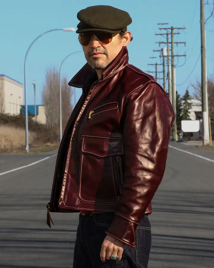 Oxblood Vintage Jacket With a Flat Cap and Raw Denim