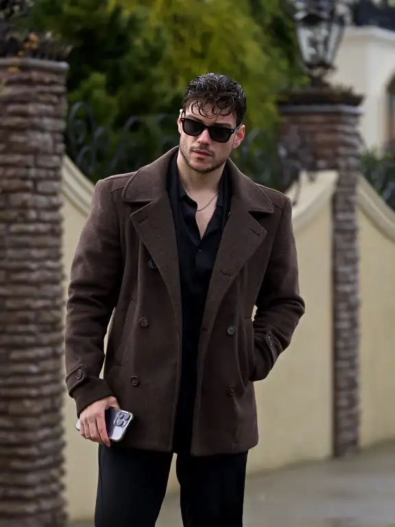 21 Winter Work Outfit Ideas for Men, From Wool Suits to Jobsite Layers 4 Brown Peacoat and a Black Shirt for Creative Offices