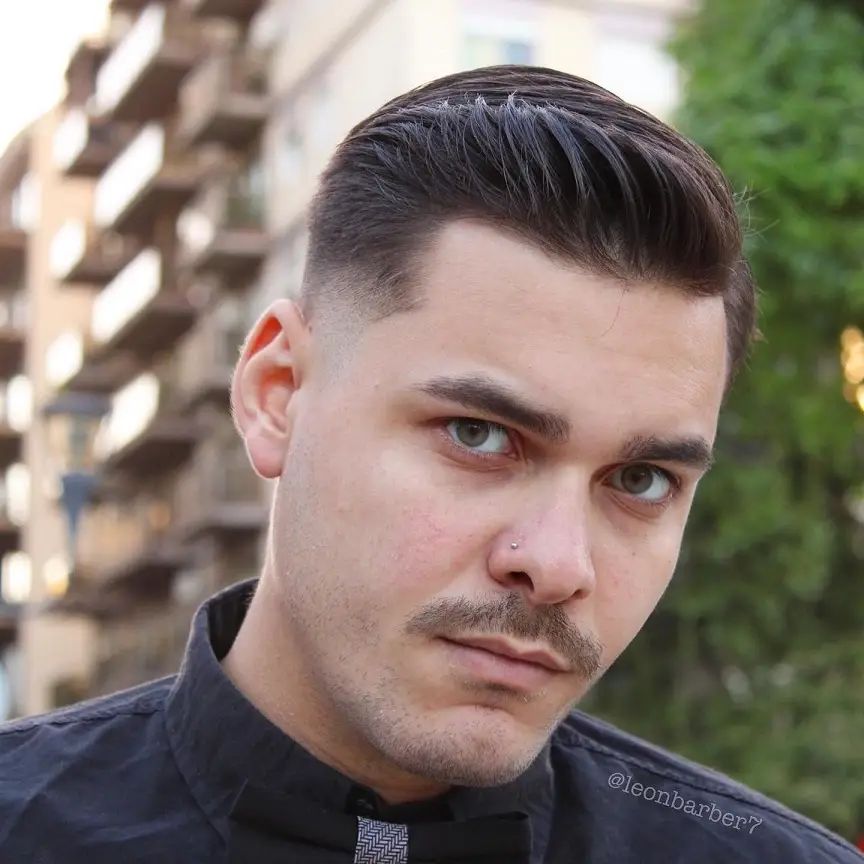 23 Sharp Gentleman Haircuts That Never Go Out of Style 7 Short Pompadour With a Tapered Temple