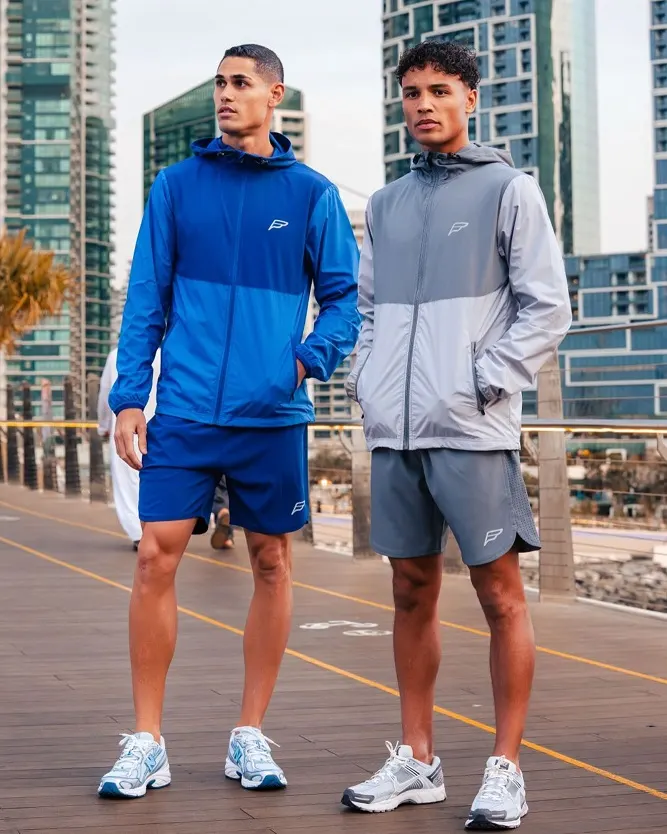 Lightweight Color Block Windbreaker Over Matching Shorts