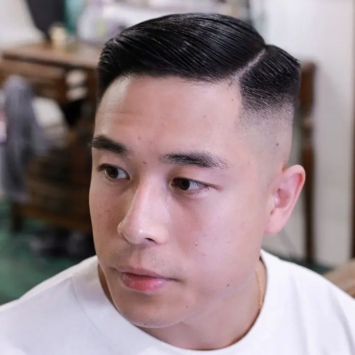 23 Sharp Gentleman Haircuts That Never Go Out of Style 3 Hard Part Comb Over With a High Skin Fade