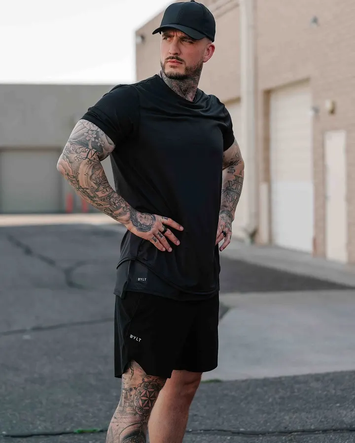 Black on Black With a Curved Drop Hem Tee