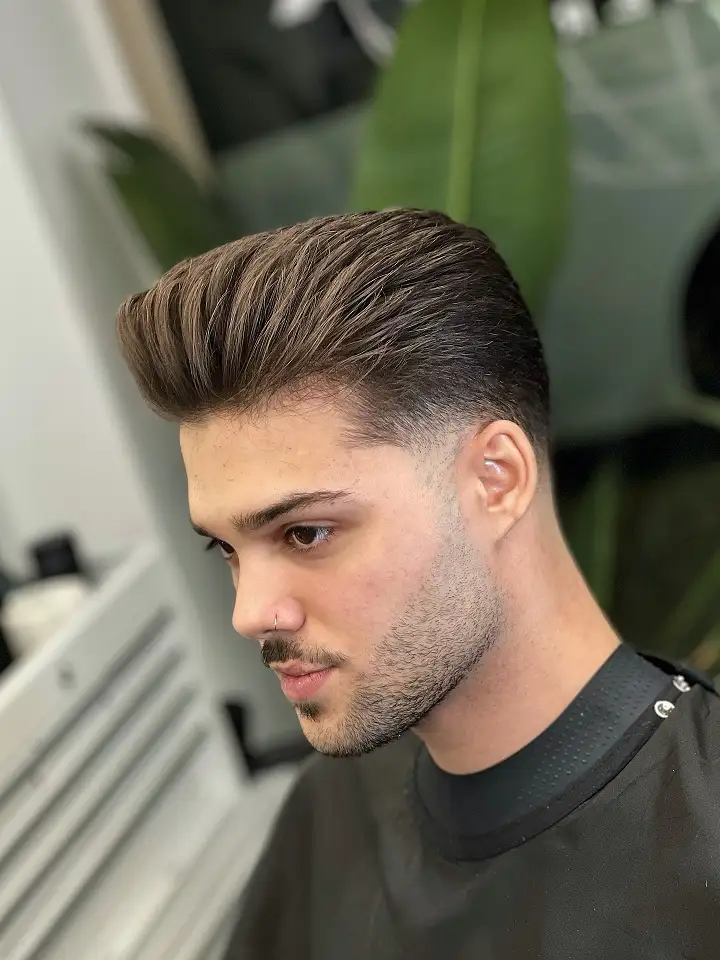 20 Pompadour Hairstyles for Men, From Skin Fades to Soft Tapers 11 Tall Textured Quiff Pompadour