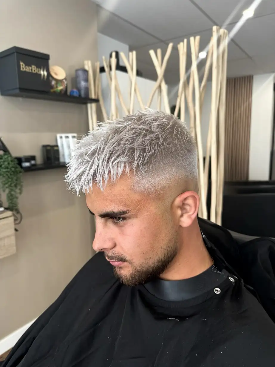 Messy Silver Spikes Over a Skin Fade
