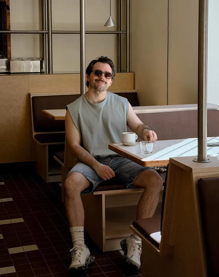 17 Summer Outfits for Short Men Who Want Better Proportions 3 Sleeveless Tank With Washed Denim Shorts